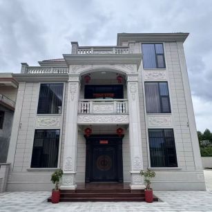 铁岭 芝麻白石材别墅干挂案例展示